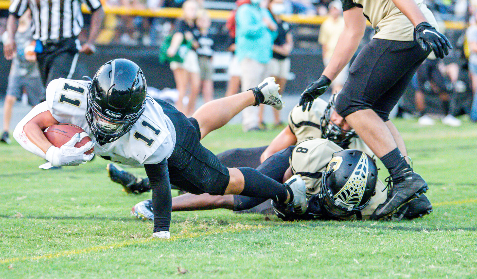 The Warriors dominated the Spiders 49-21.